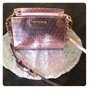 pink metallic michael kors purse